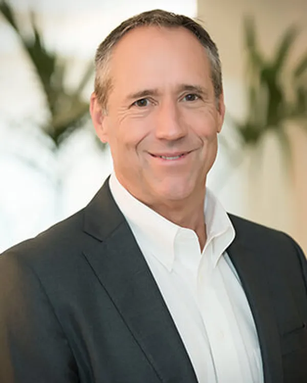 Mark A. Slack, Partner